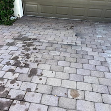Pressure-Washing-Driveway-Oil-Stain-and-paint-removal-from-paver-driveway-located-at-Greenacres-FL-33415 4